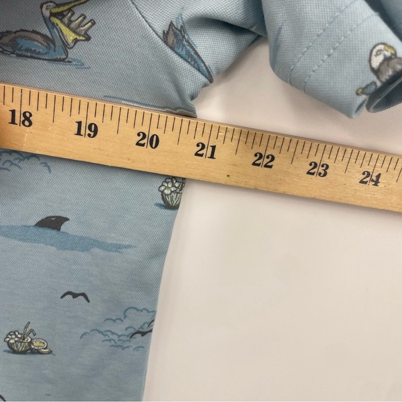 Travis Mathew Polo Shirt Mens Medium Going Rogue Party Parrots Pelicans Beer - Picture 7 of 7